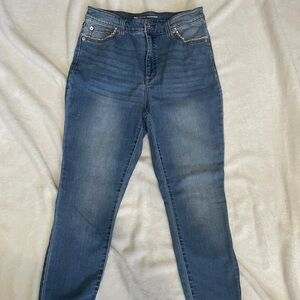 INC skinny jeans with rhinestone detail